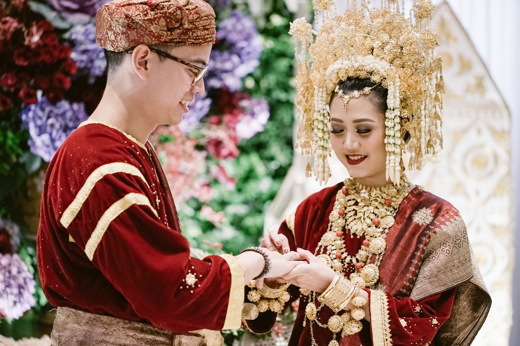 Mempelai pernikahan adat Minang © Bridestory.com