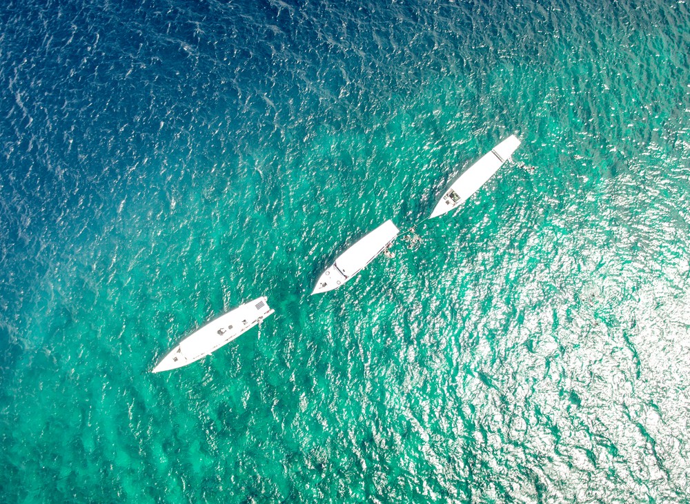 Kapal nelayan | @Ricko Rullyarto Piscesso Shutterstock