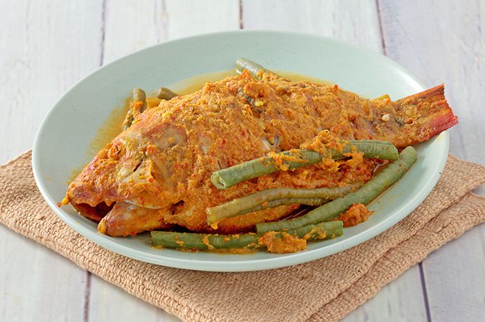 Ikan Mas atau Arsik Sumatra olahan ikan tradisional khas Indonesia