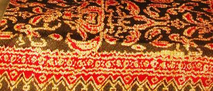 kain tenun cual motif sumping garuda