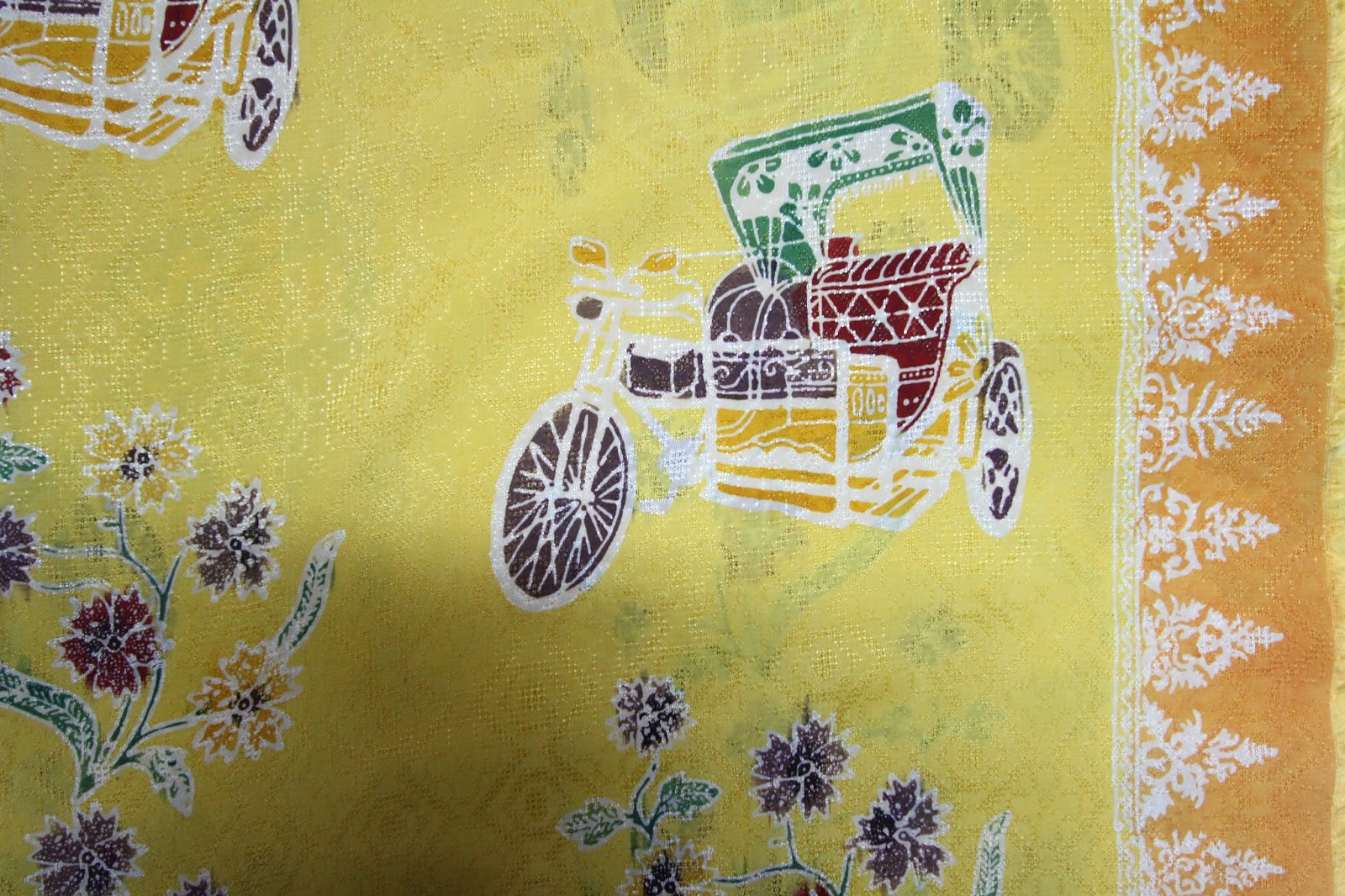 motif becak motor dan pucuk rebung