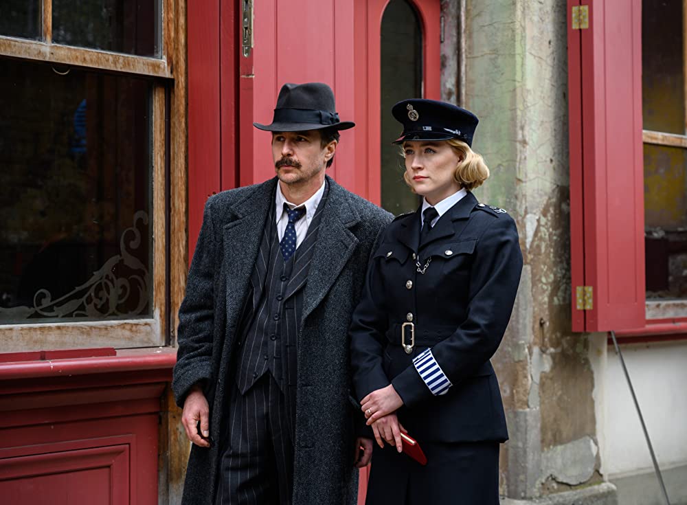 Sam Rockwell and Saoirse Ronan in See How They Run 2022