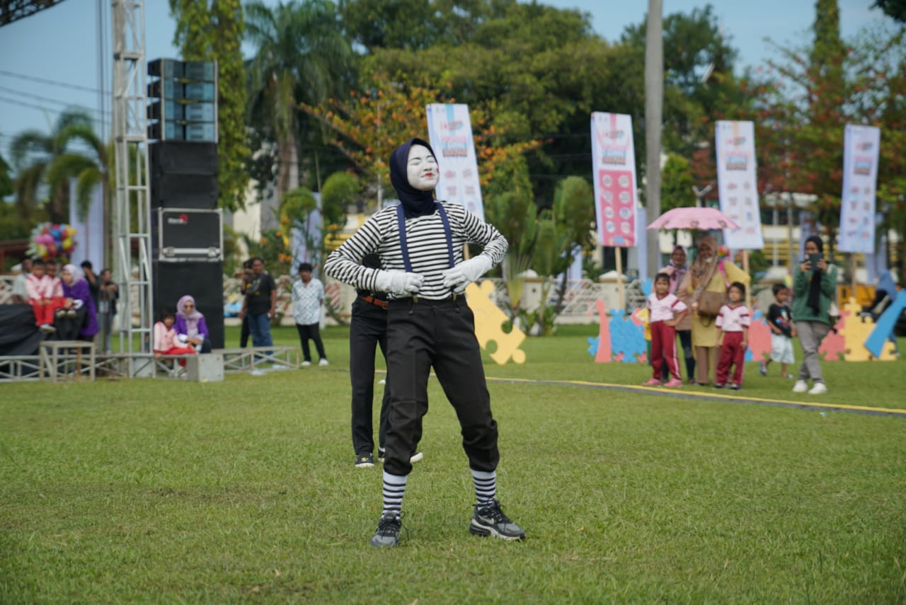 Bermain di Taman